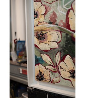 Détail du tableau et de son encadrement.
